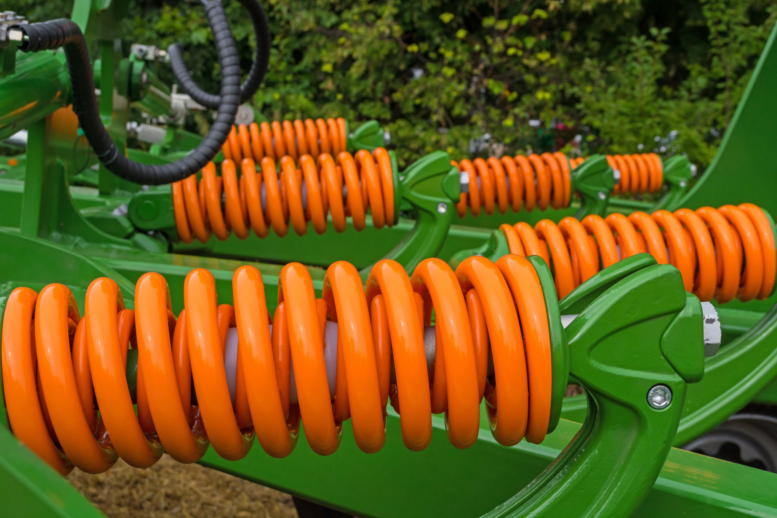 shock absorbers of the agricultural unit, which create impacts on the soil by working parts, in order to create cracks, to penetrate moisture