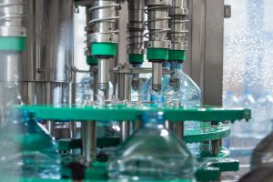 Automatic bottling drinking water in five-liter plastic bottles - Ace Wire Spring & Form Co Spring Bottling Conveyer